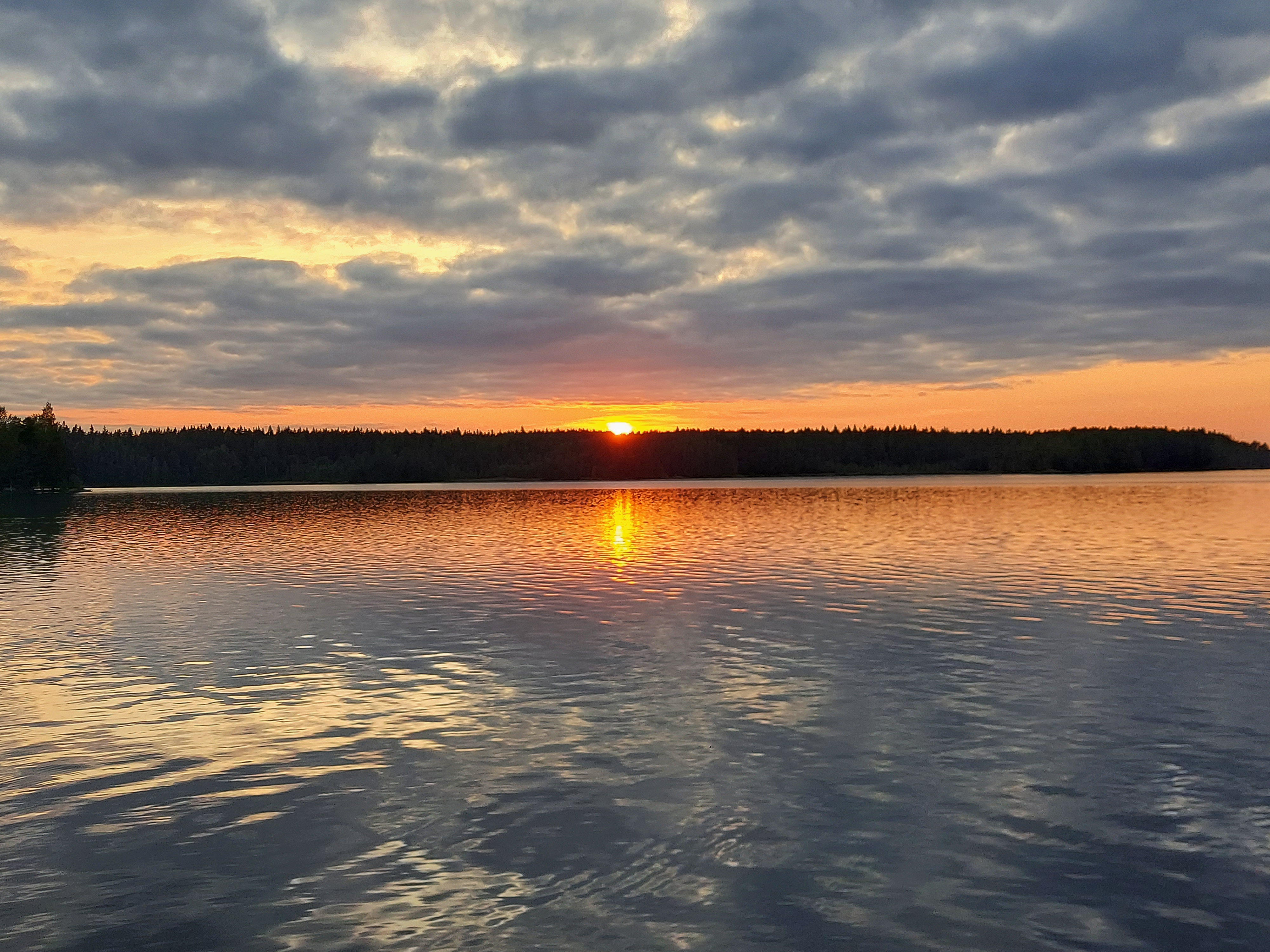 Auringonlasku. Kuva: Ilona Lahtinen, Kotus.